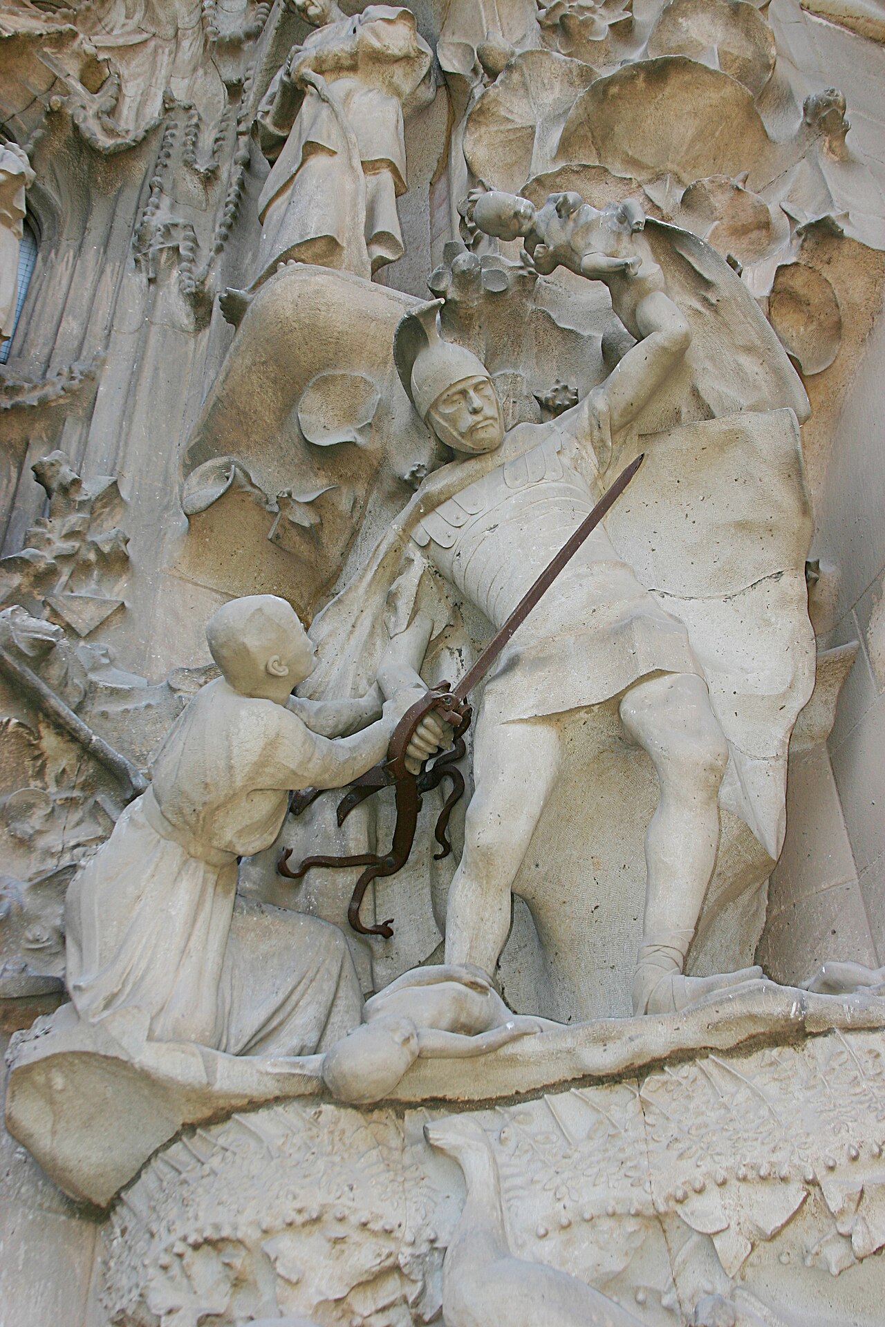 Figurative sculpture details across the basilica façades